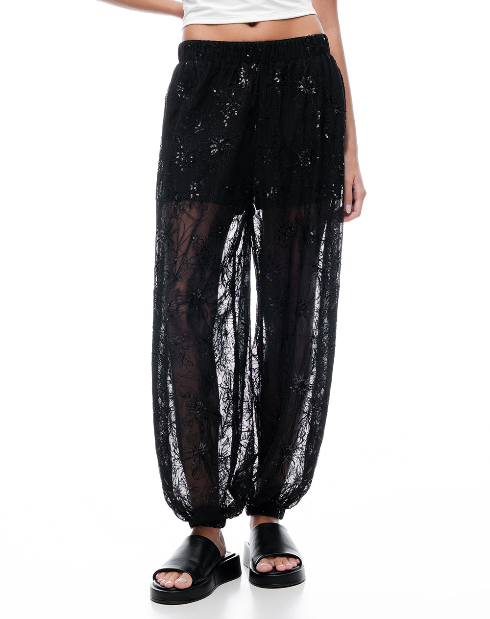 Pantalón harem tiro medio semitransparente negro mujer