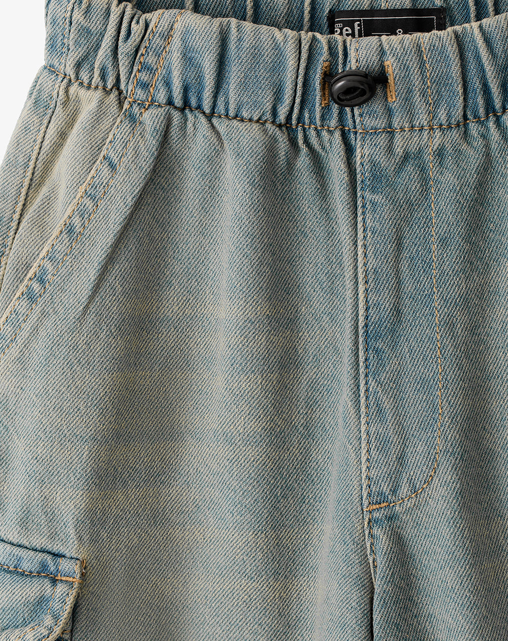 Jean tipo jogger cargo índigo medio niño