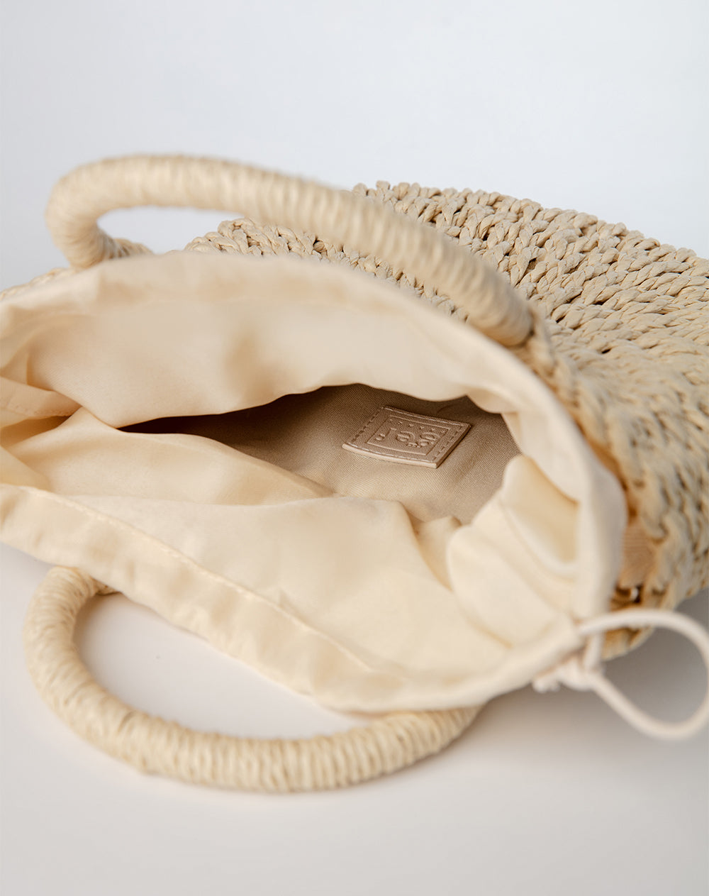 Bolso tipo cesta tejido beige mujer