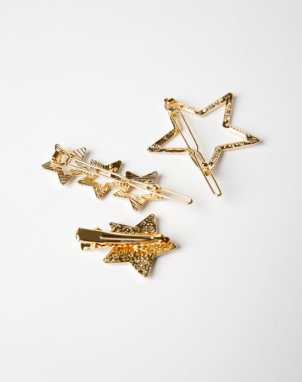 Set de ganchos para el cabello x3unds doradas