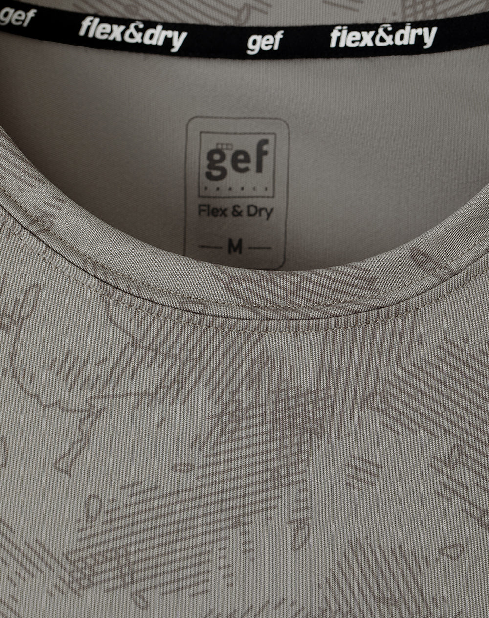 Camiseta deportiva control humedad gris hombre