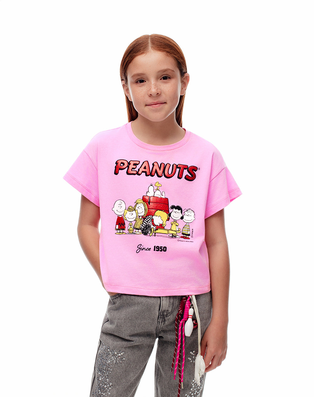 Camiseta regular Peanuts rosada niña