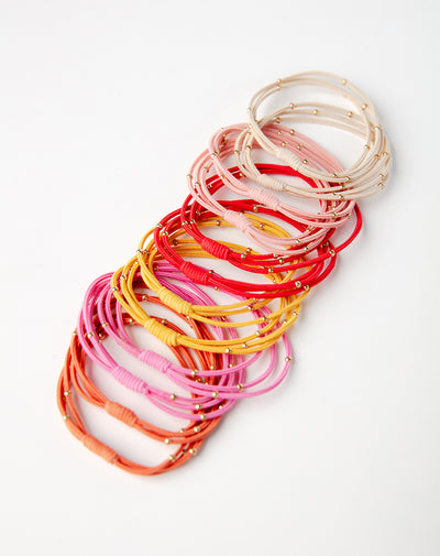 Coleteros elásticos x12unds surtidos niña