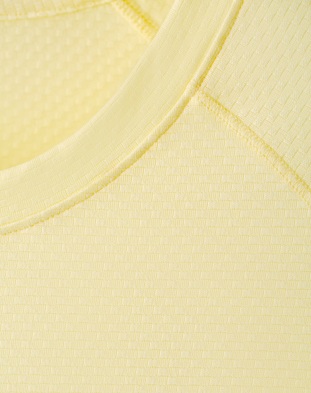 Camiseta deportiva control humedad amarilla hombre