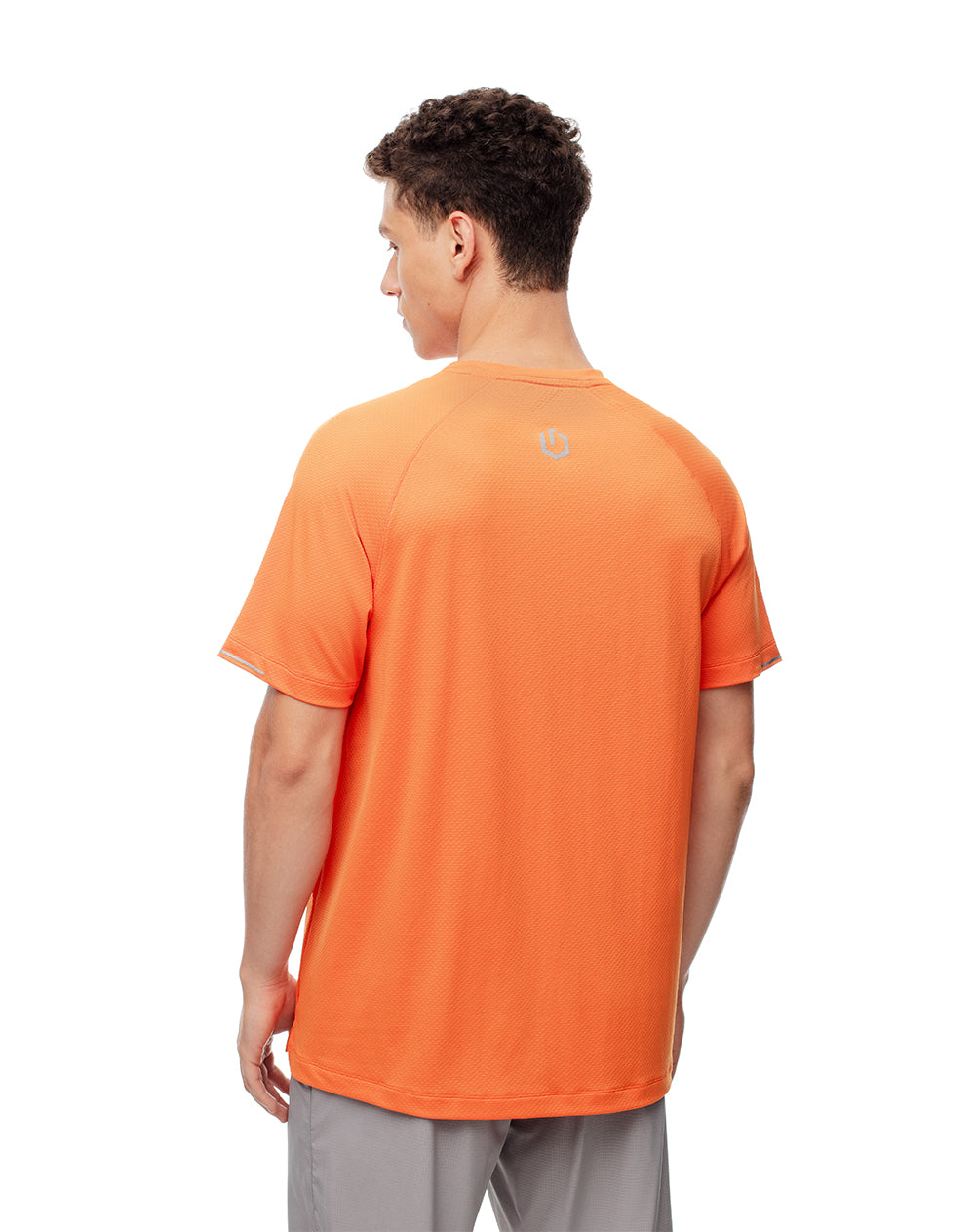 Camiseta deportiva control humedad naranja hombre