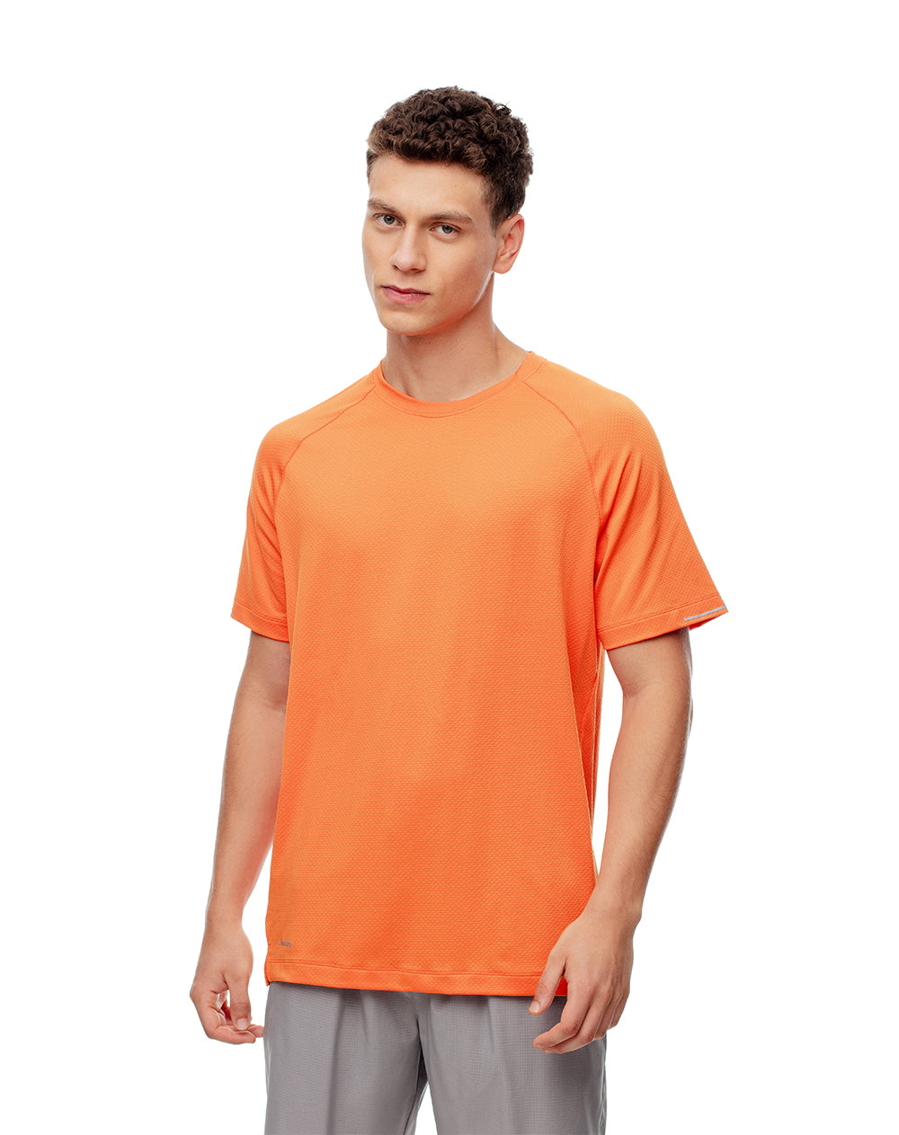 Camiseta deportiva control humedad naranja hombre