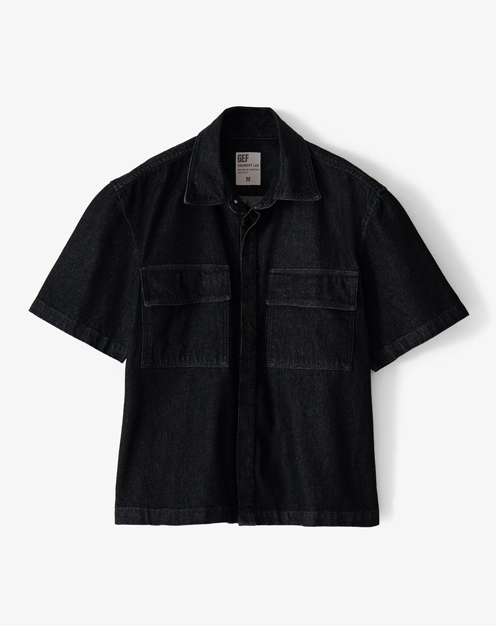 Camisa loose fit manga corta negra hombre