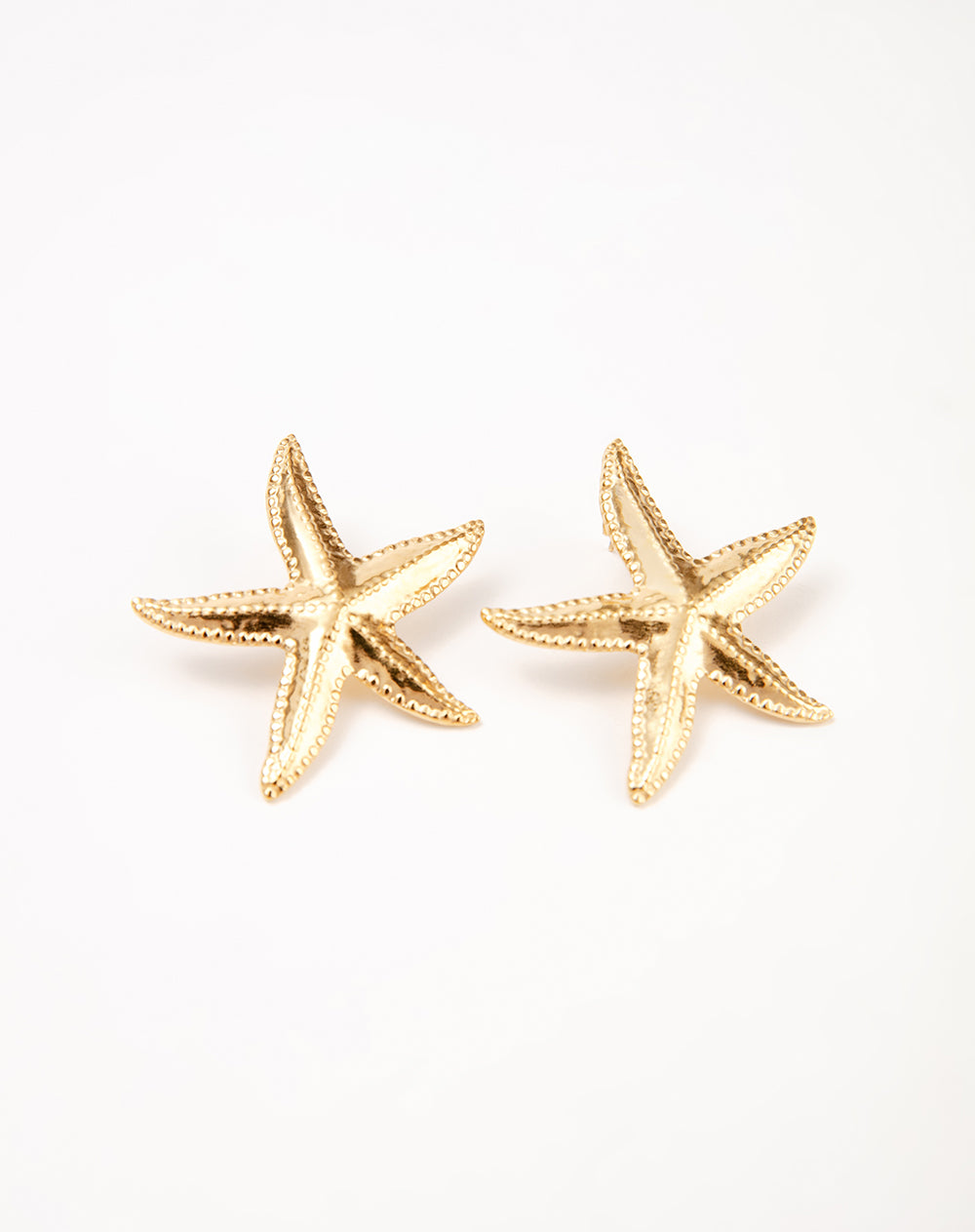 Aretes estrellas dorados