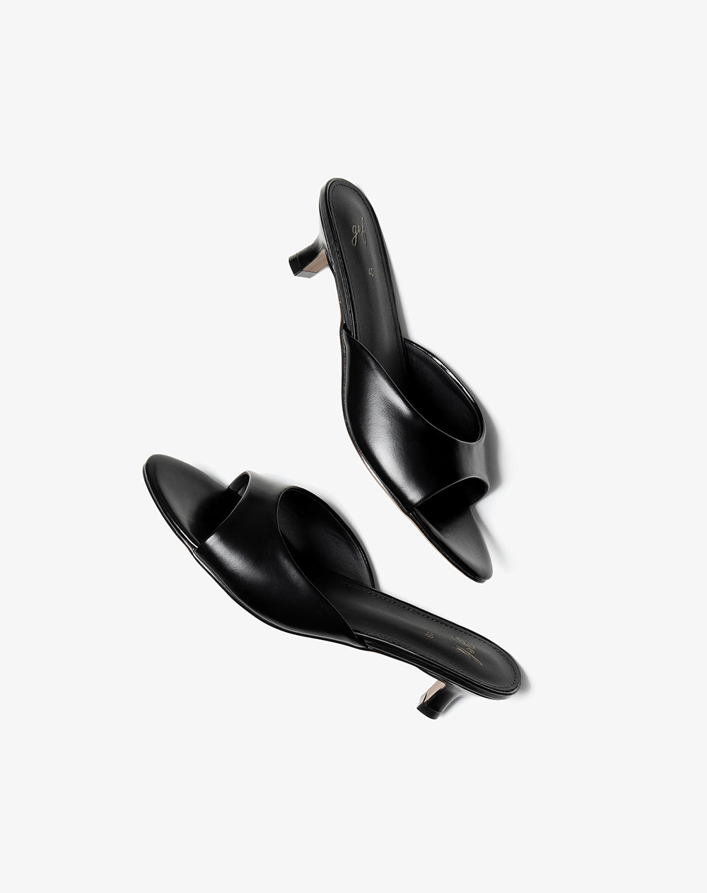 Sandalias mule de tacón bajo negro mujer