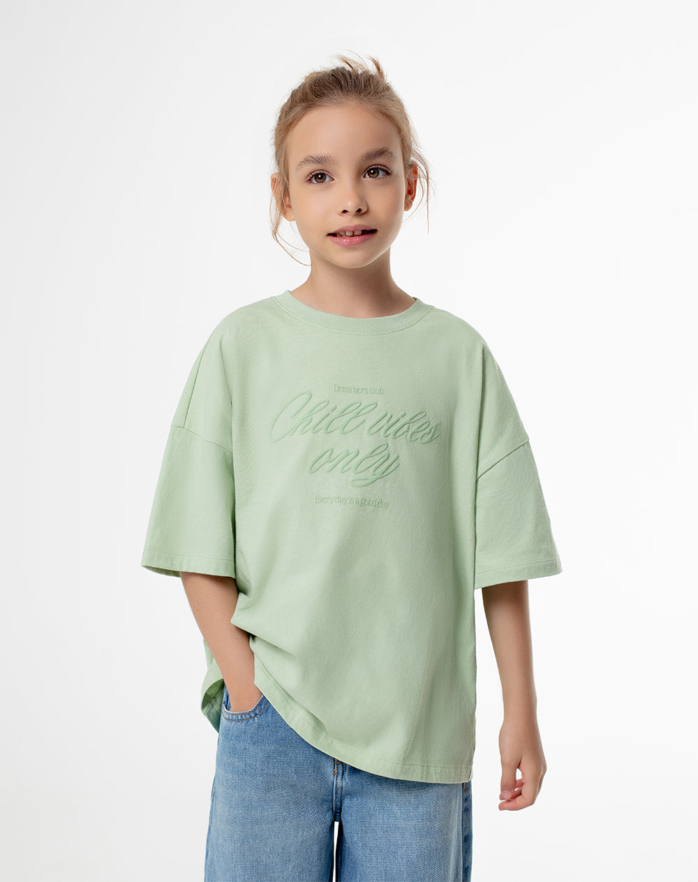 Camiseta oversize algodón verde estampada niña