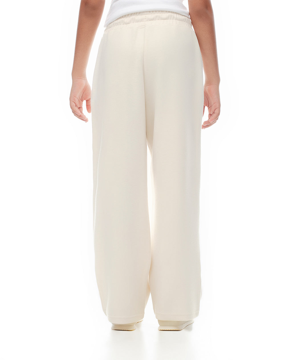 Pantalón holgado tiro medio crema niña