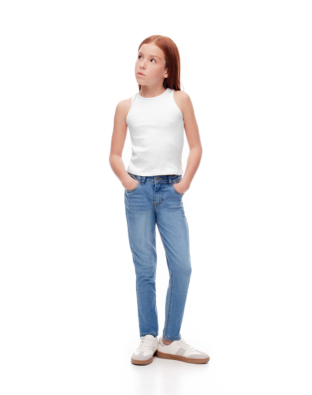Jean skinny tiro medio elástico interno indigo medio para niña
