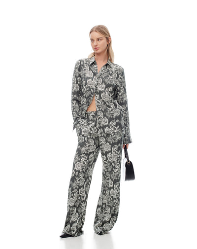 Pantalón loose fit tiro medio verde estampado