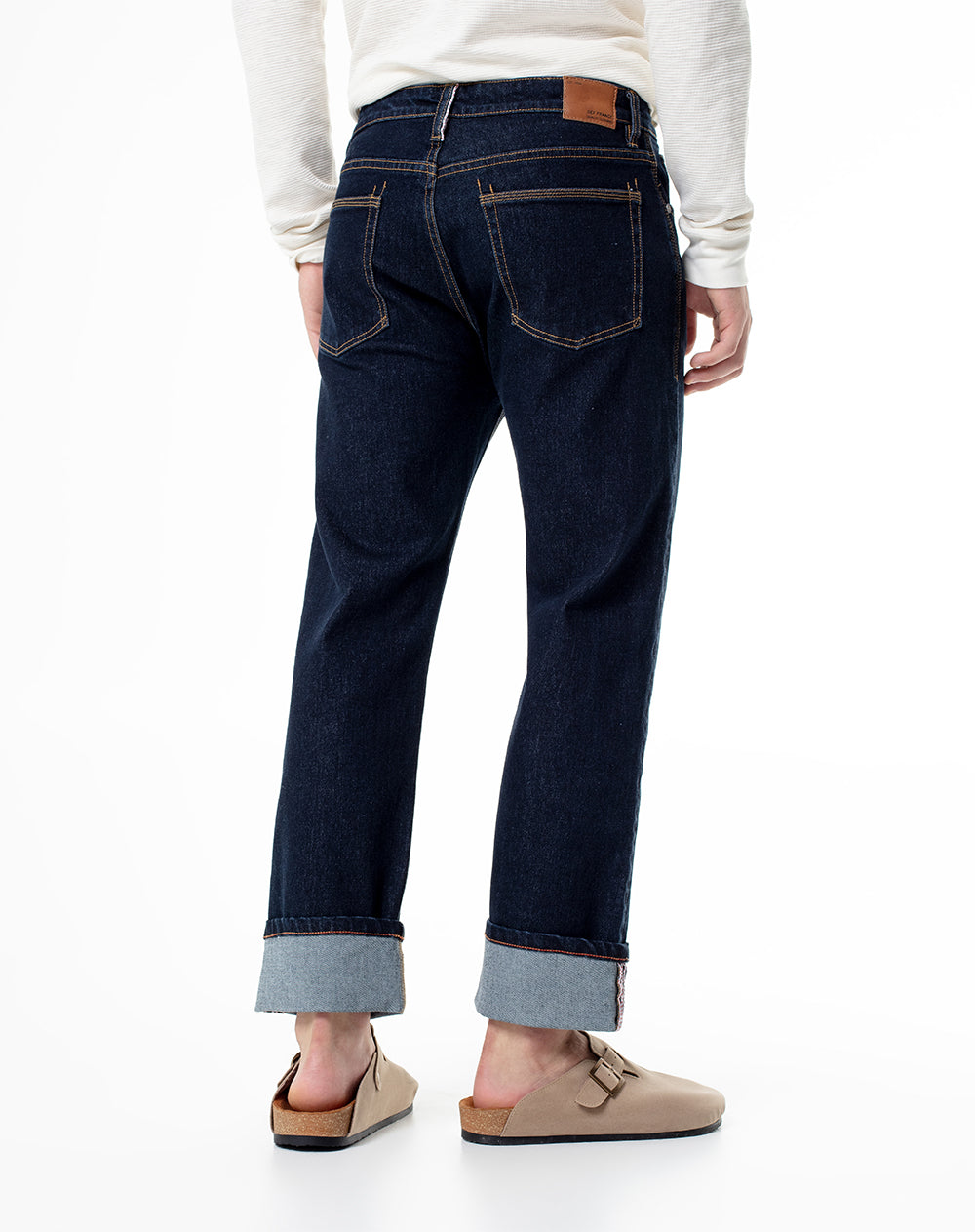 Jean recto dobadillo índigo oscuro hombre