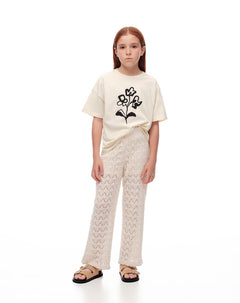 Pantalón recto tiro medio tejido crema niña