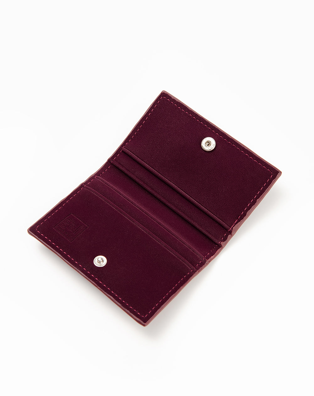 Porta tarjetas vinotinto