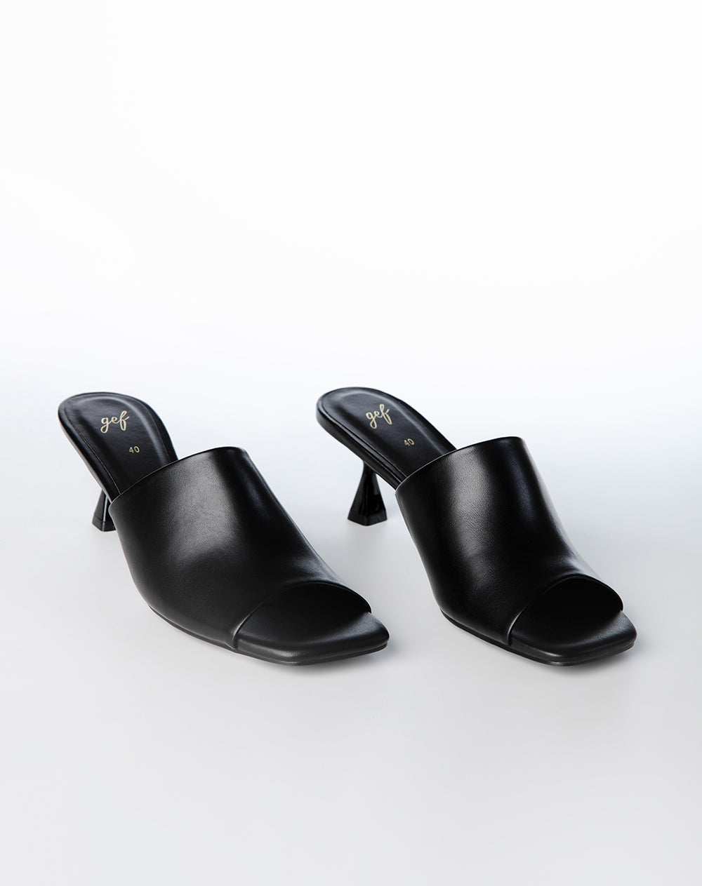 Sandalias mules de tacón bajo negras mujer1