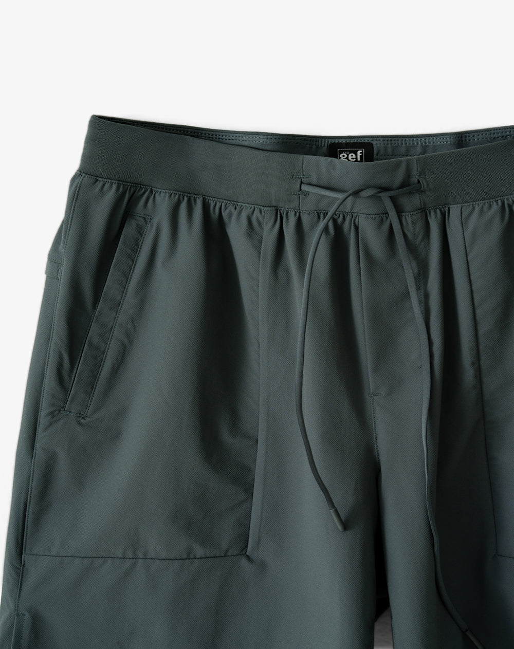 Pantaloneta deportiva verde hombre