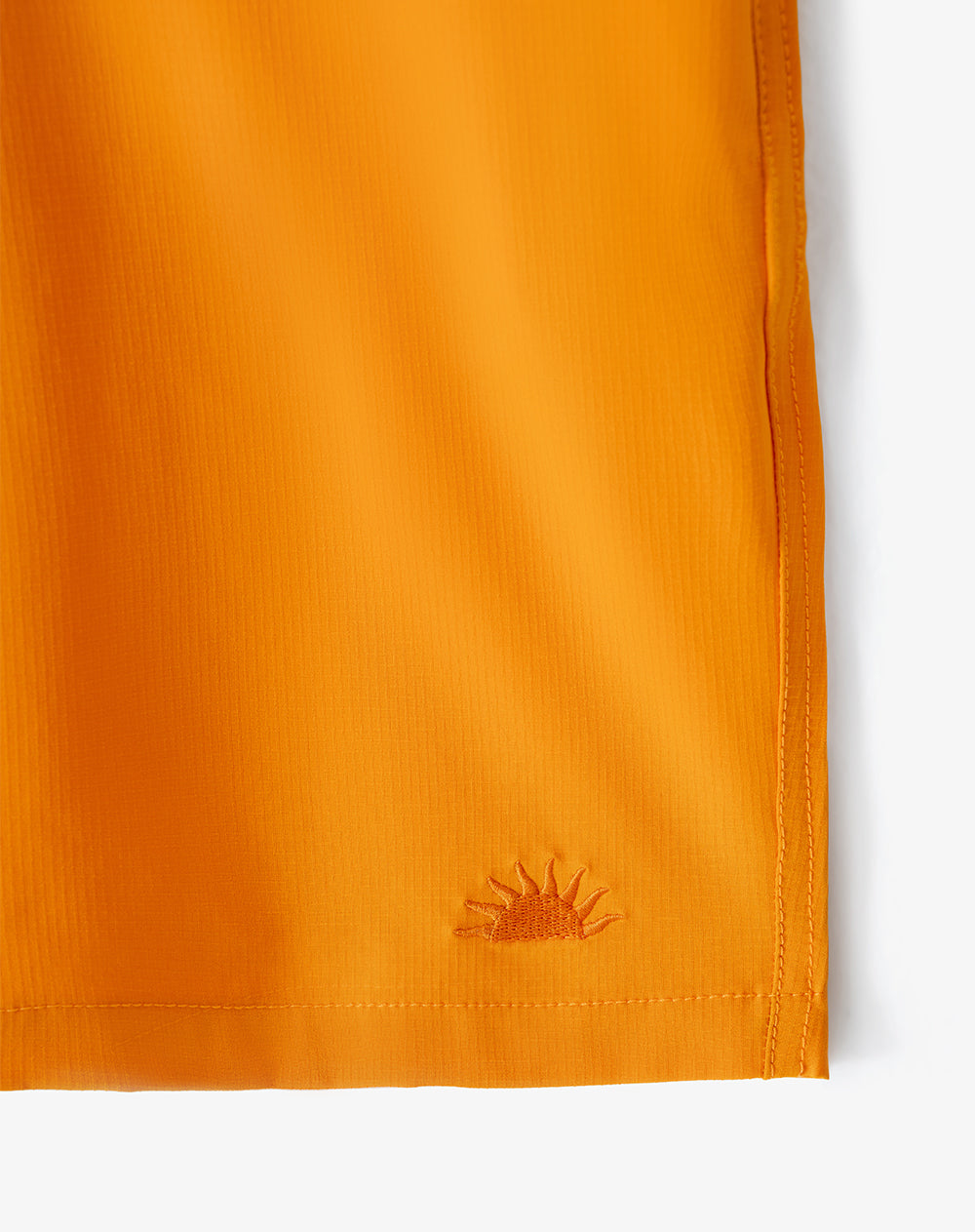 Pantaloneta naranja hombre