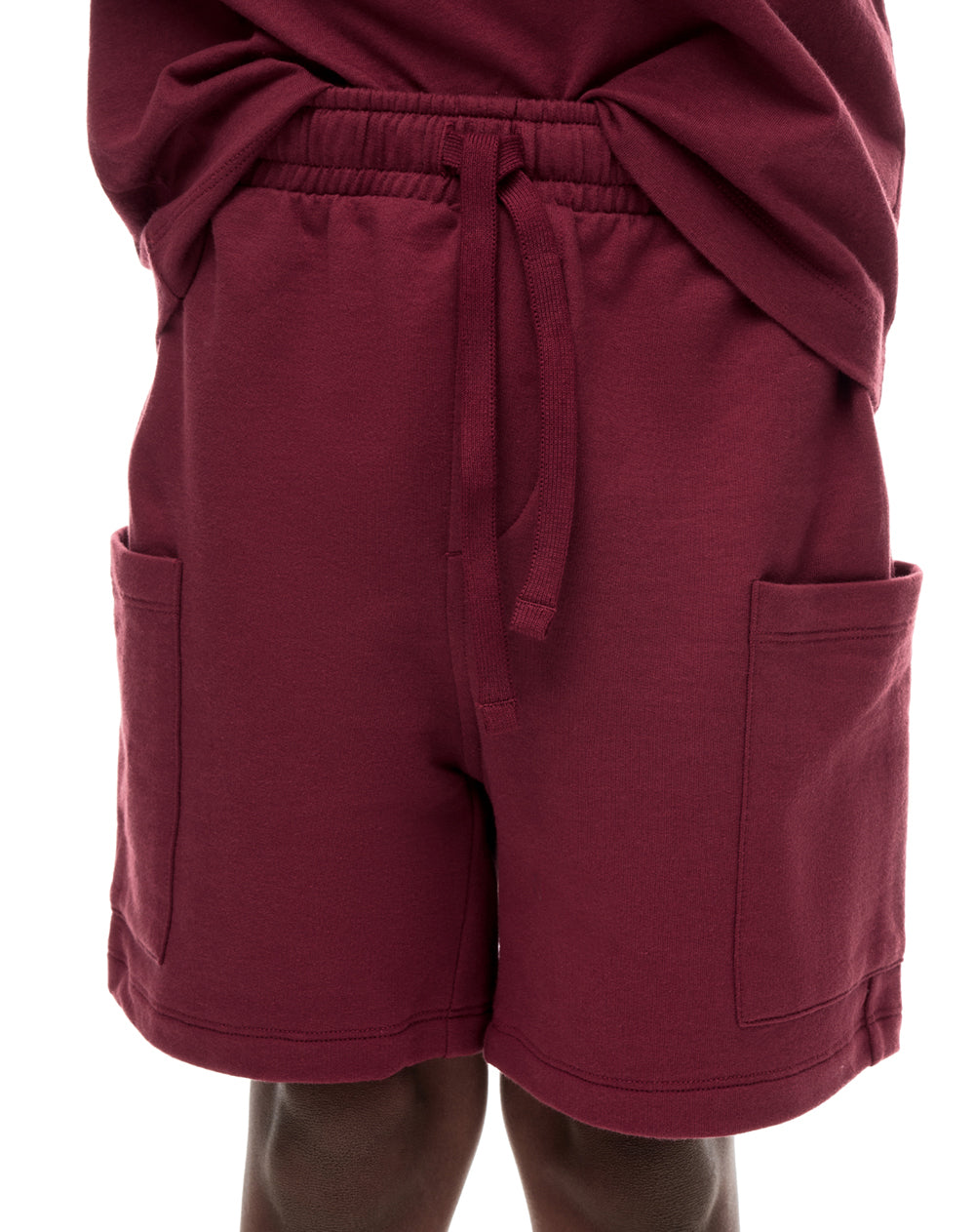 Conjunto pantalon corto camiseta vinotinto niño