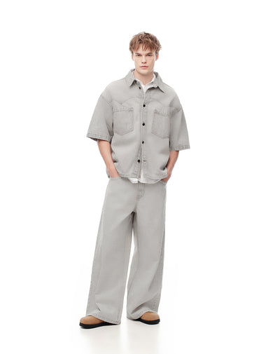 Jean regular fit tiro medio denim gris