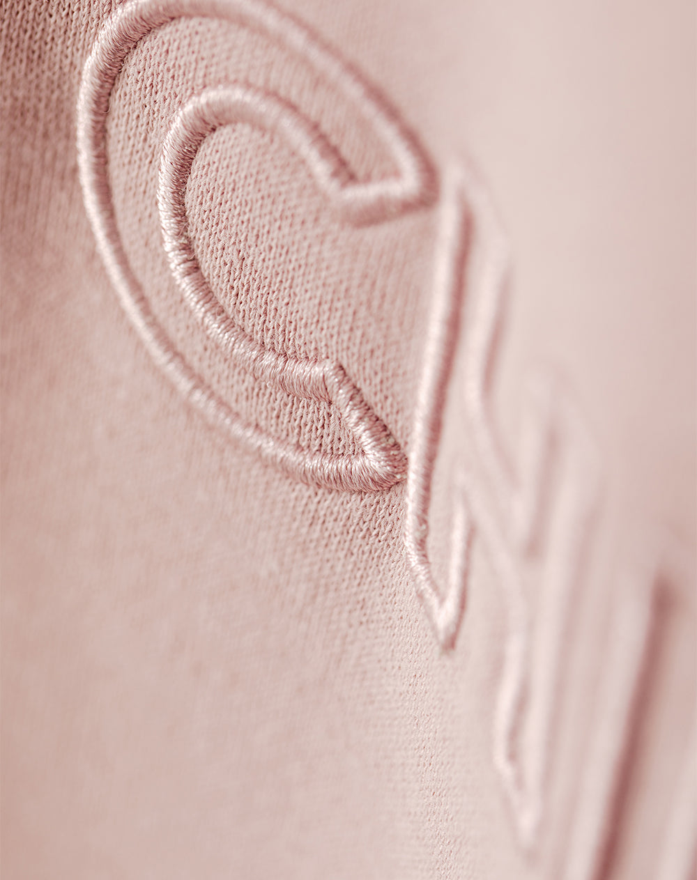 Buzo loose fit palo de rosa