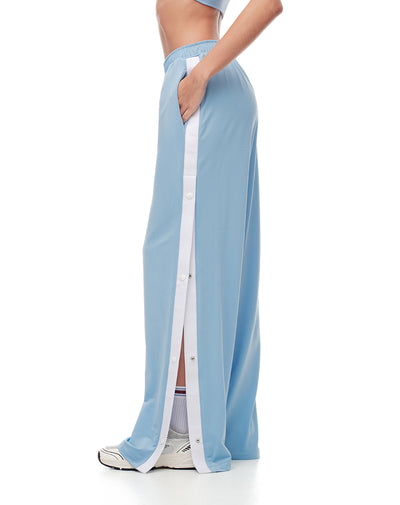 Pantalón deportivo broches laterales azul mujer