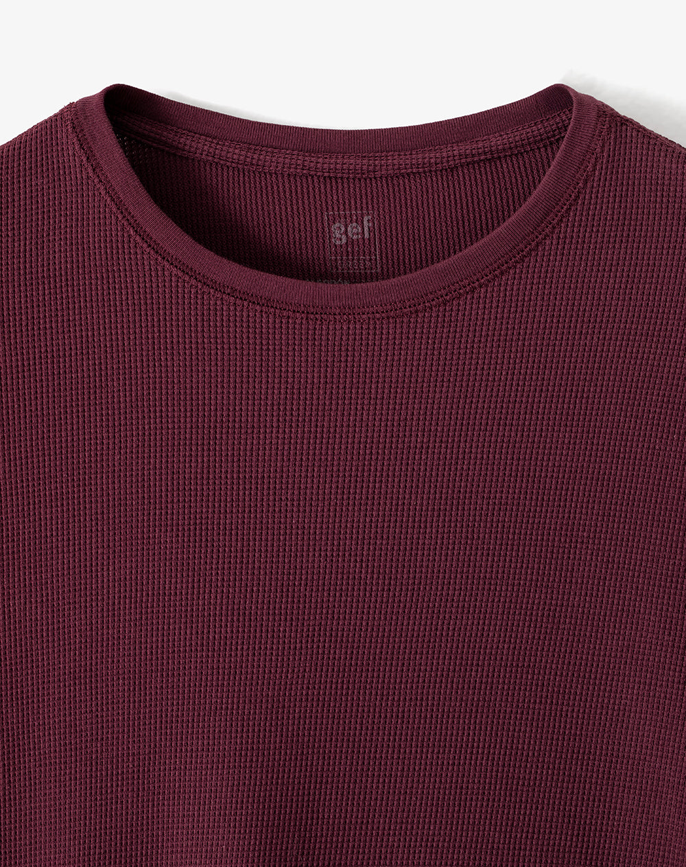 Camiseta relaxed fit manga larga vinotinto