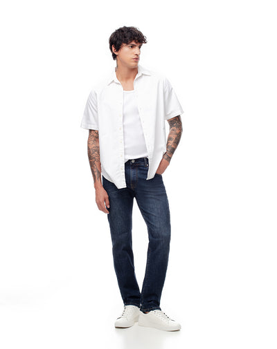 Jean slim fit tiro medio indigo oscuro