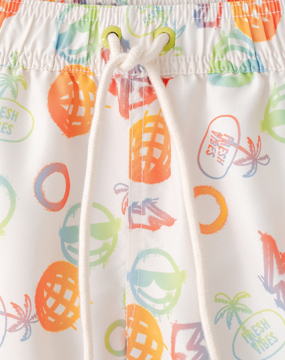 Pantaloneta de baño crema estampada niño