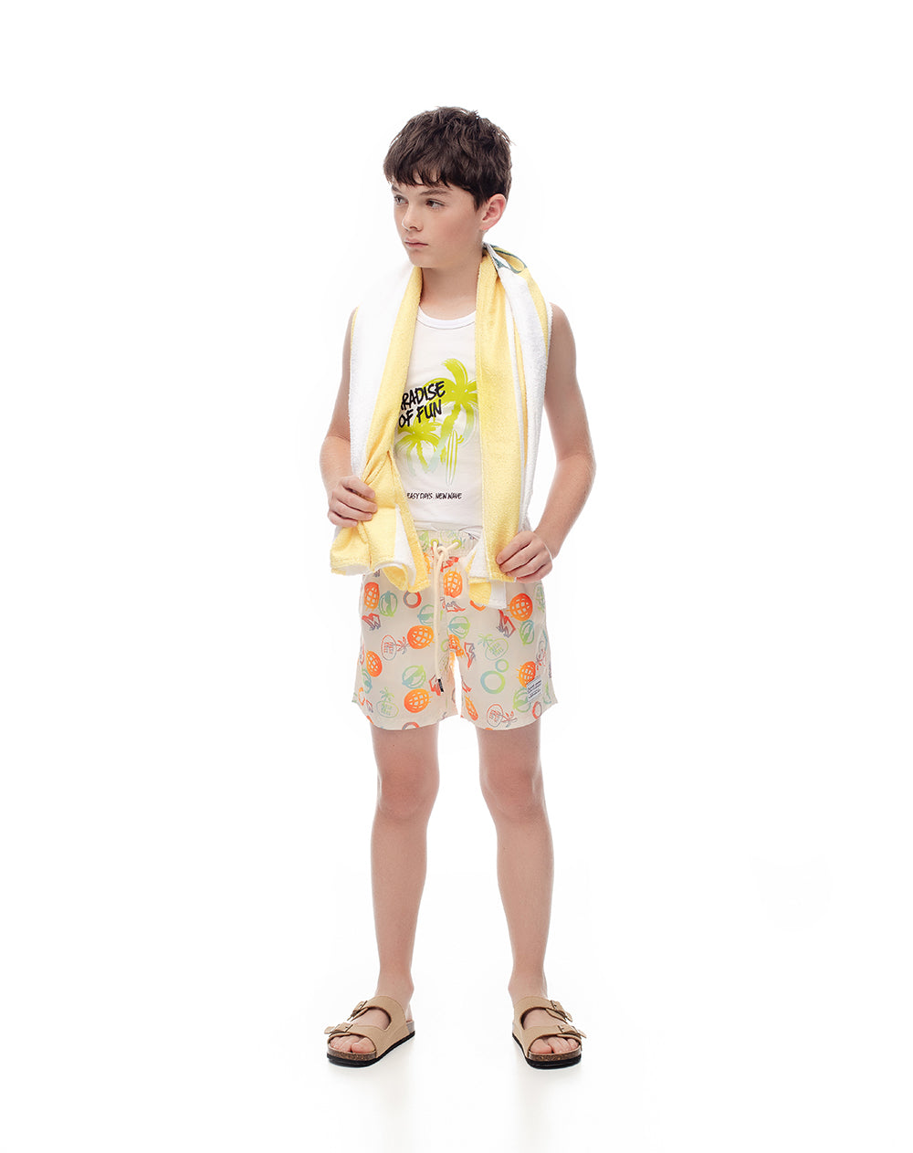 Pantaloneta de baño crema estampada niño