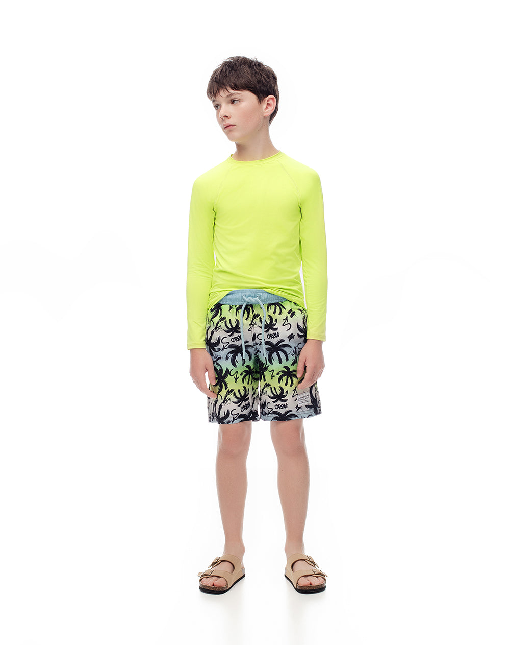 Pantaloneta de baño azul estampada niño