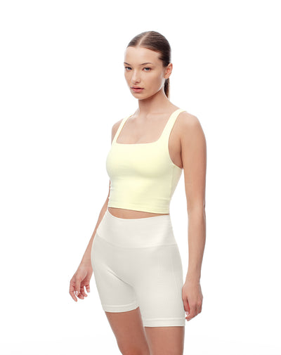 Camiseta crop deportiva secado rápido amarilla mujer