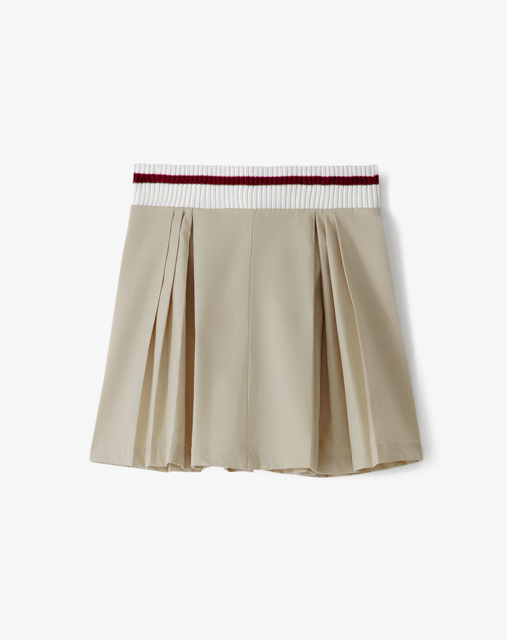 Falda corta con pliegues beige niña
