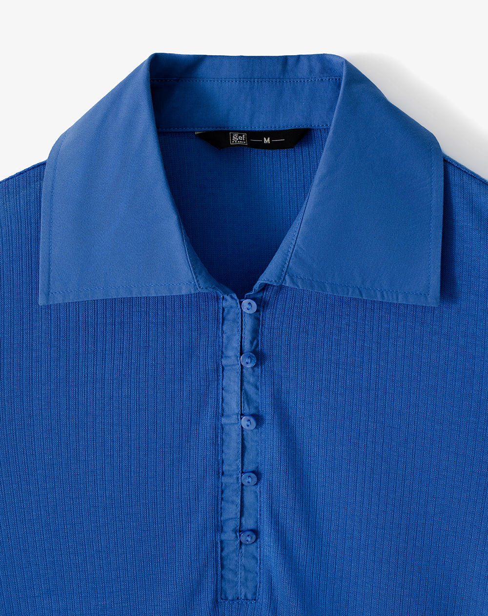 Polo slim tejido de punto azul mujer