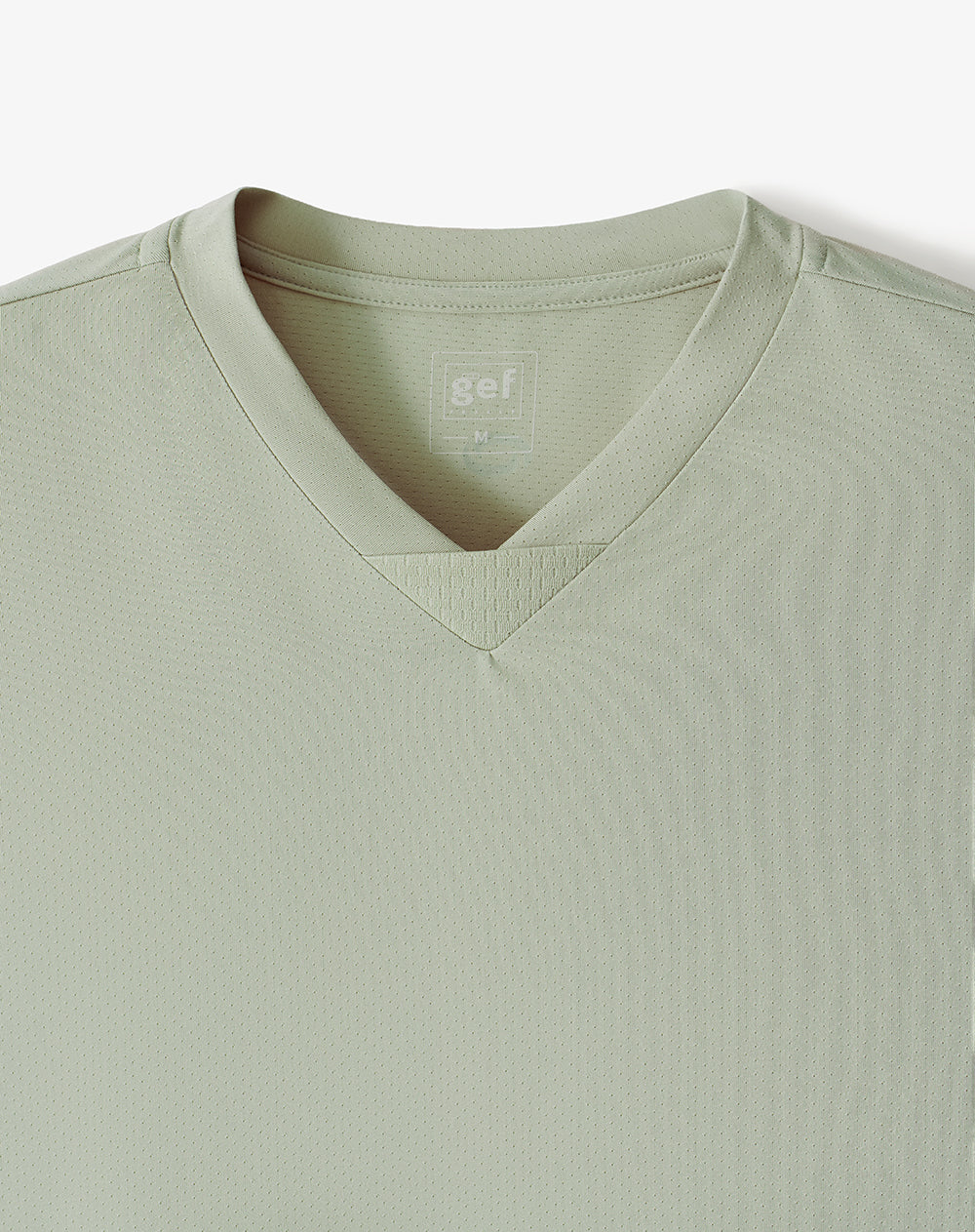 Camiseta deportiva control de humedad verde hombre