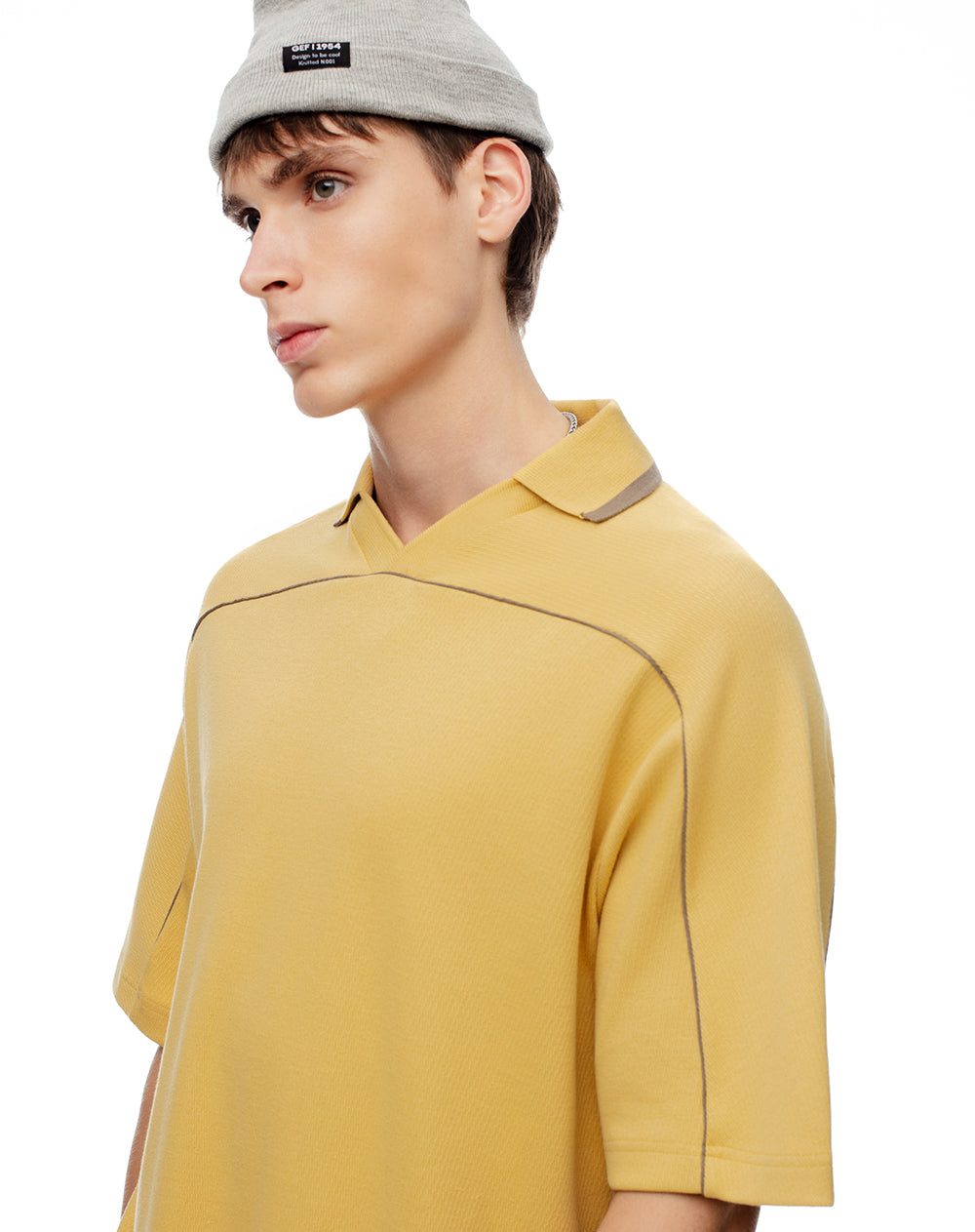 Camiseta tipo polo oversize amarilla hombre