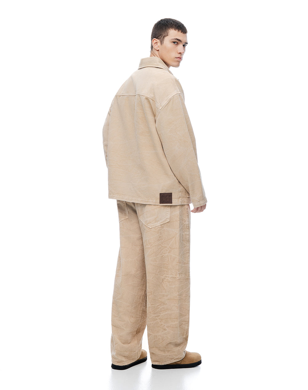 Chaqueta tipo trucker denim café hombre