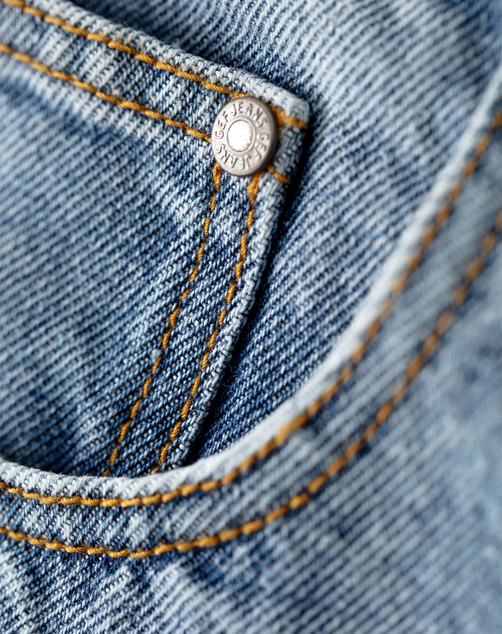 Jean regular fit tiro medio indigo