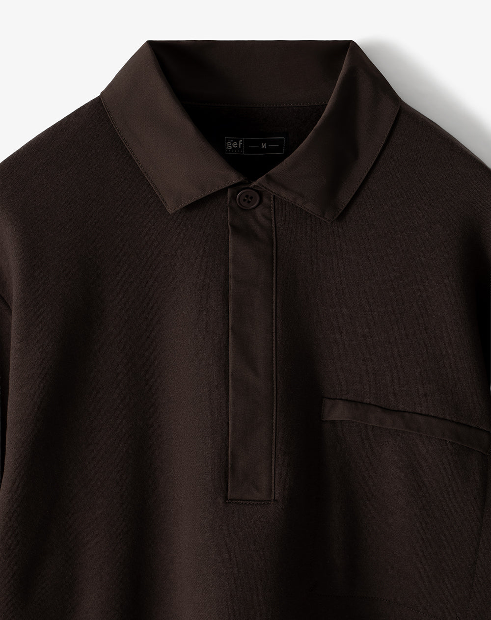 Buzo tipo polo café hombre