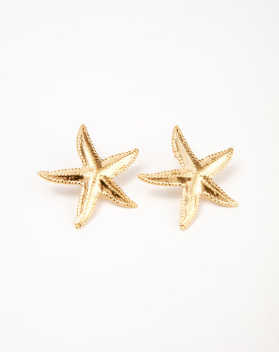 Aretes estrellas dorados mujer