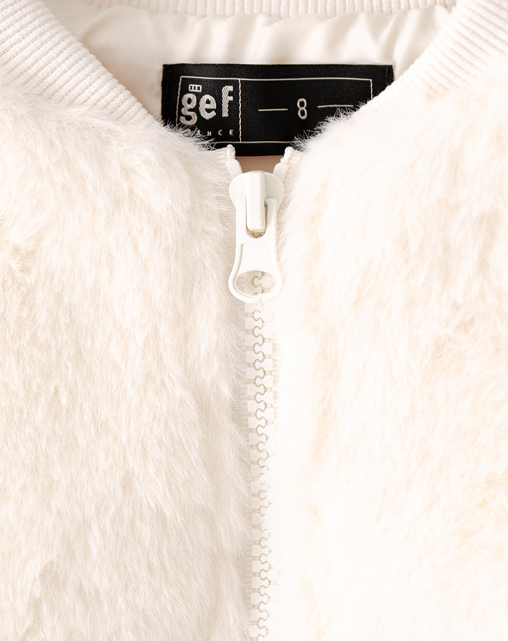 Chaqueta bomber efecto peluche crema niña