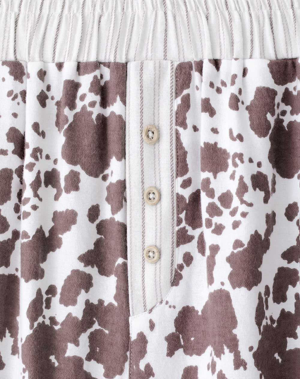 Pantalón relaxed fit tiro medio crudo estampado