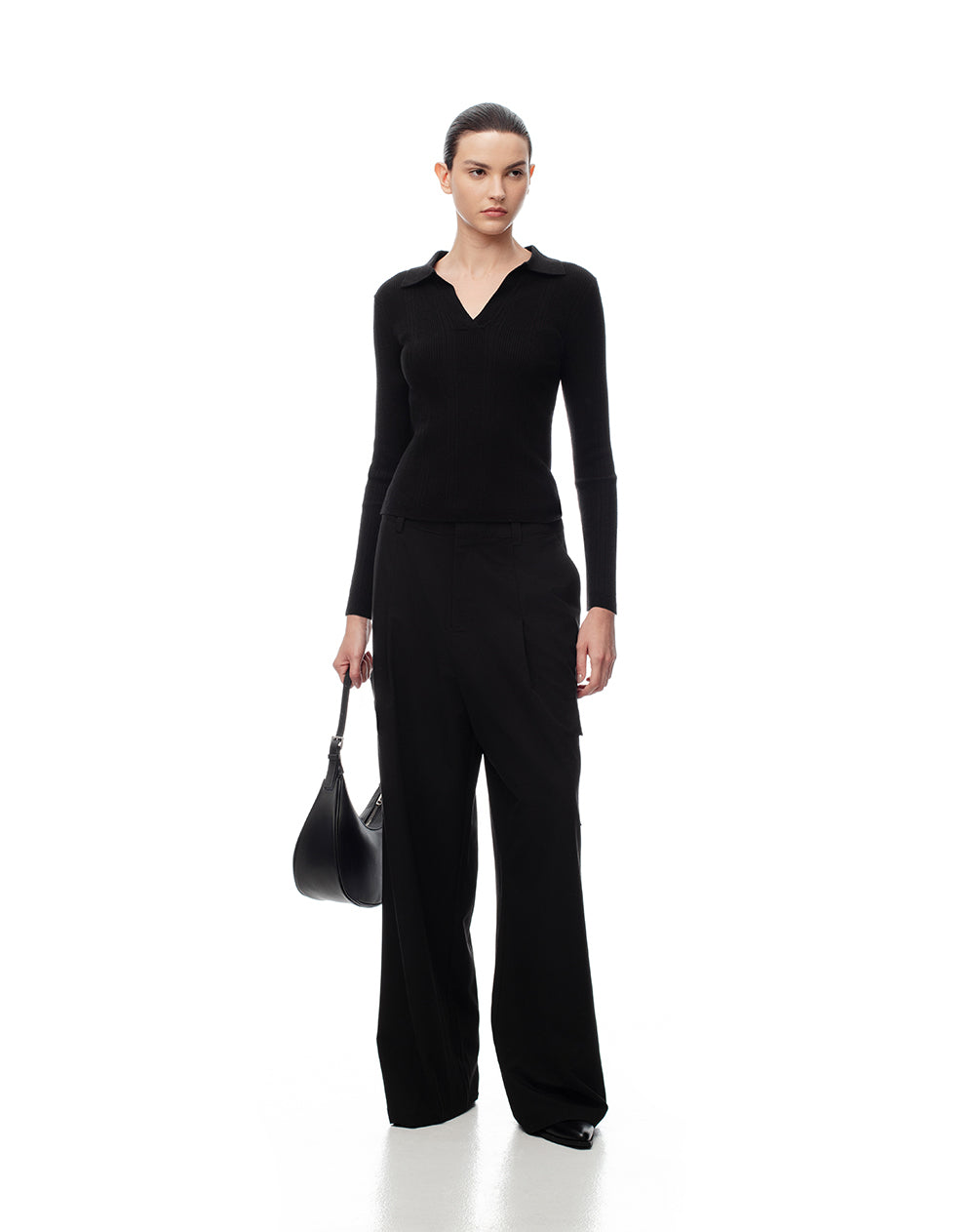 Camibuzo tipo polo slim tejido de punto negro mujer