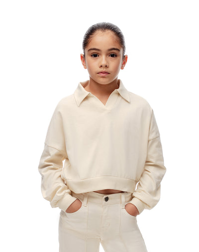 Buzo tipo polo regular crema niña