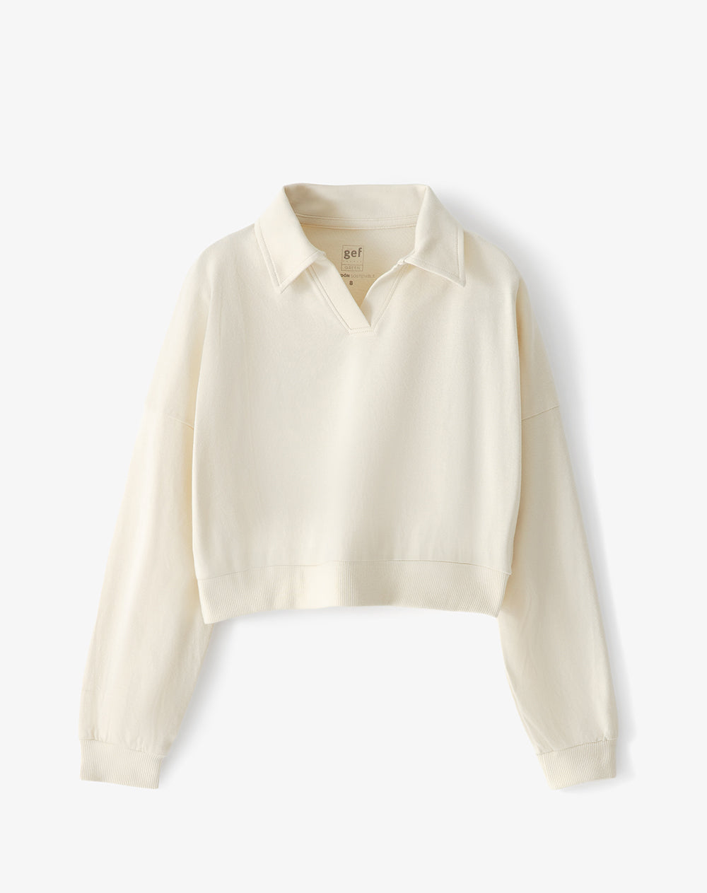 Buzo tipo polo regular crema niña