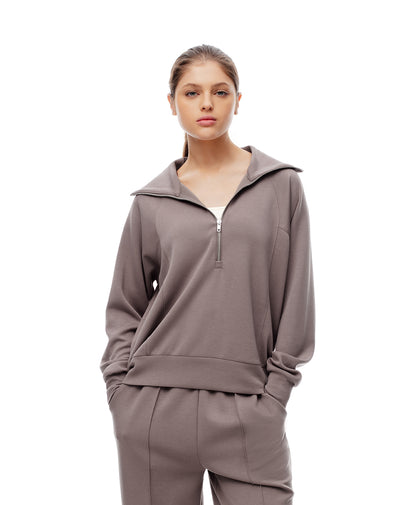 Buzo holgado café mujer