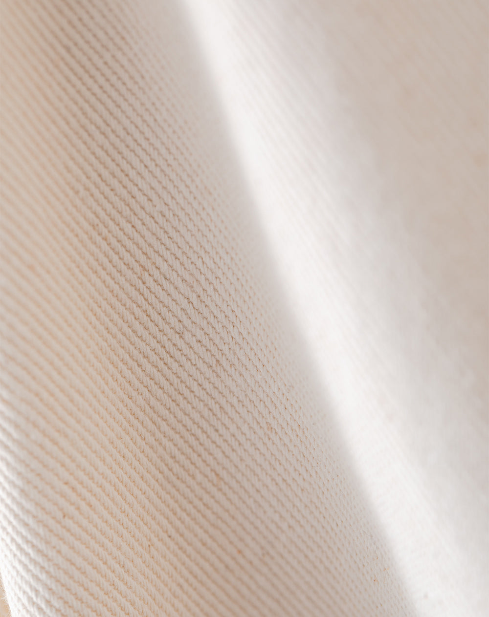 Pantalón loose fit tiro medio en drill crema