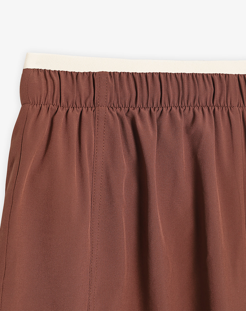 Short deportivo café mujer