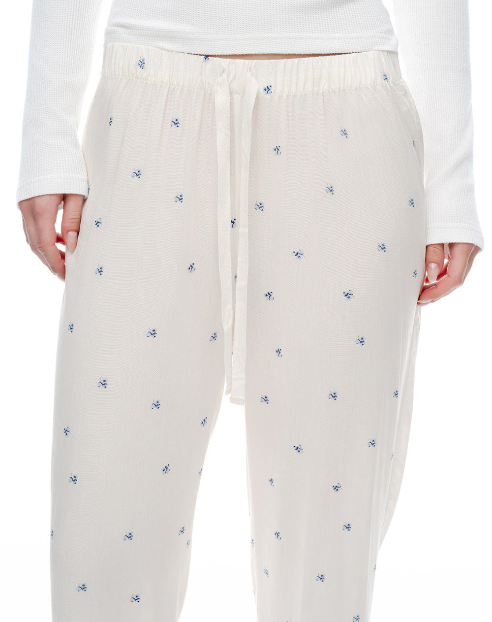 Pantalón regular tiro medio blanco estampado mujer